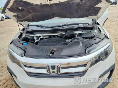 Zdjęcie 12 z 13 samochodu: 2021 HONDA PILOT EX VIN:5FNYF5H30MB013674 - miniatura