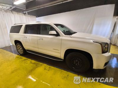 Czwarte zdjęcie samochodu z boku: 2015 GMC YUKON XL DENALI VIN:1GKS2JKJ8FR547864 - miniatura