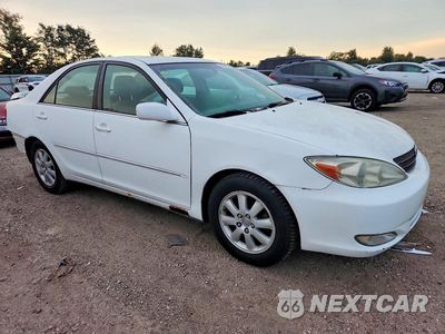 Czwarte zdjęcie samochodu z boku: 2003 TOYOTA CAMRY XLE VIN:4T1BE30KX3U256202 - miniatura