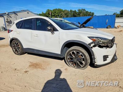 Czwarte zdjęcie samochodu z boku: 2016 MAZDA CX-5 GT VIN:JM3KE2DY3G0694707 - miniatura