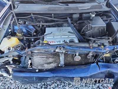 Zdjęcie 12 z 14 samochodu: 2004 TOYOTA HIGHLANDER BASE VIN:JTEEP21A340015940 - miniatura