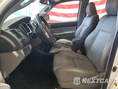 Zdjęcie 7 z 12 samochodu: 2013 TOYOTA TACOMA V6 VIN:3TMLU4EN0DM126147 - miniatura