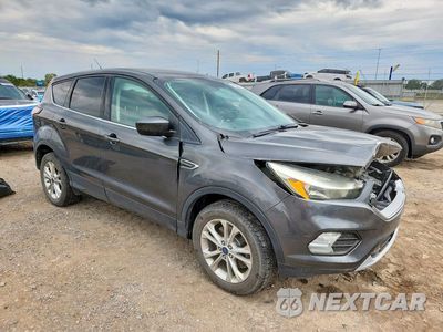 Czwarte zdjęcie samochodu z boku: 2017 FORD ESCAPE SE VIN:1FMCU9G9XHUB05381 - miniatura