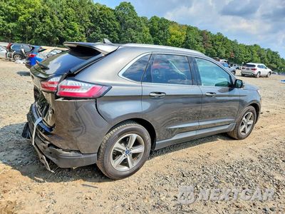 Trzecie zdjęcie samochodu z tyłu: 2019 FORD EDGE SEL VIN:2FMPK3J96KBC35202 - miniatura