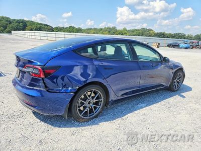 Trzecie zdjęcie samochodu z tyłu: 2021 TESLA MODEL 3 VIN:5YJ3E1EB5MF836828 - miniatura