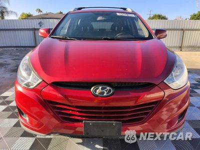 Piąte zdjęcie samochodu w środku: 2011 HYUNDAI TUCSON GLS VIN:KM8JU3AC6BU212024 - miniatura