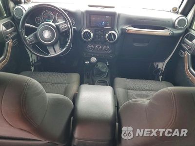 Zdjęcie 8 z 13 samochodu: 2011 JEEP WRANGLER UNLIMITED SAHARA VIN:1J4BA5H16BL604356 - miniatura
