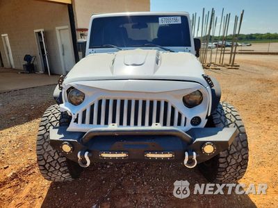 Piąte zdjęcie samochodu w środku: 2016 JEEP WRANGLER SPORT VIN:1C4AJWAG3GL151410 - miniatura