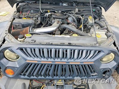 Zdjęcie 11 z 12 samochodu: 2007 JEEP WRANGLER SAHARA VIN:1J8FA54107L201311 - miniatura