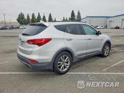Trzecie zdjęcie samochodu z tyłu: 2014 HYUNDAI SANTA FE SPORT 2.0T VIN:5XYZU3LA8EG220795 - miniatura