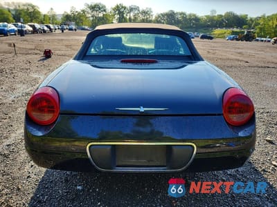 Zdjęcie 6 z 13 samochodu: 2002 FORD THUNDERBIRD VIN:1FAHP60AX2Y120294 - miniatura