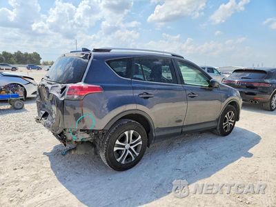 Trzecie zdjęcie samochodu z tyłu: 2018 TOYOTA RAV4 LE VIN:JTMBFREV0JJ746461 - miniatura