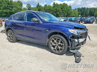 Czwarte zdjęcie samochodu z boku: 2019 ALFA ROMEO STELVIO TI VIN:ZASPAKBN7K7C33438 - miniatura