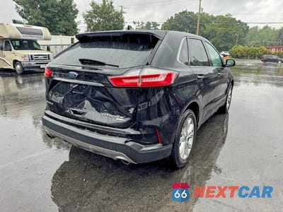Trzecie zdjęcie samochodu z tyłu: 2020 FORD EDGE TITANIUM VIN:2FMPK4K99LBB35682 - miniatura