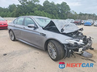 Czwarte zdjęcie samochodu z boku: 2013 BMW M5 VIN:WBSFV9C52DC773475 - miniatura