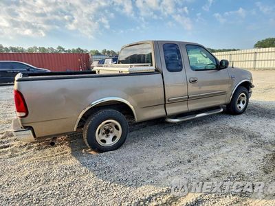 Trzecie zdjęcie samochodu z tyłu: 2003 FORD F-150 VIN:1FTRX17W33NB42823 - miniatura