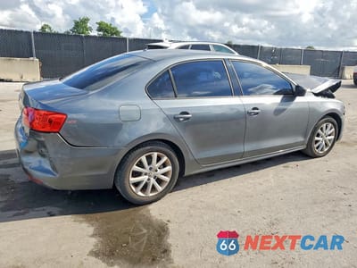 Trzecie zdjęcie samochodu z tyłu: 2014 VOLKSWAGEN JETTA BASE VIN:3VW2K7AJ8EM237324 - miniatura