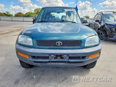 Piąte zdjęcie samochodu w środku: 1997 TOYOTA RAV4 BASE VIN:JT3GP10V5V7019593 - miniatura
