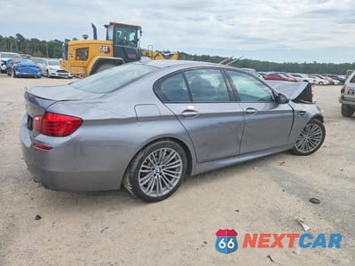 Trzecie zdjęcie samochodu z tyłu: 2013 BMW M5 VIN:WBSFV9C52DC773475 - miniatura