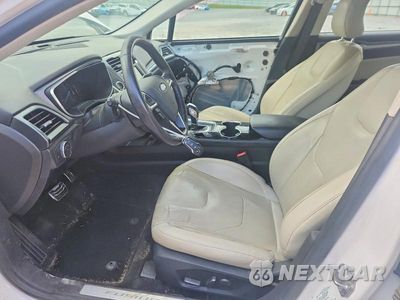 Zdjęcie 7 z 13 samochodu: 2016 FORD FUSION TITANIUM HEV VIN:3FA6P0RU8GR127252 - miniatura