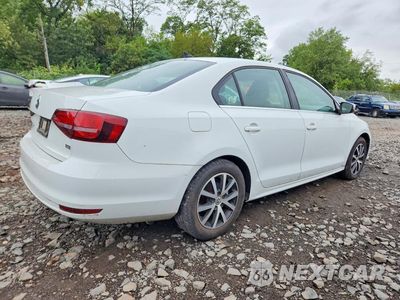 Trzecie zdjęcie samochodu z tyłu: 2017 VOLKSWAGEN JETTA SE VIN:3VWDB7AJ1HM368656 - miniatura