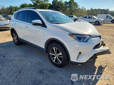 Czwarte zdjęcie samochodu z boku: 2018 TOYOTA RAV4 XLE VIN:JTMWFREV3JJ744544 - miniatura