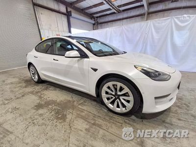 Czwarte zdjęcie samochodu z boku: 2022 TESLA MODEL 3 VIN:5YJ3E1EA7NF188076 - miniatura
