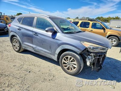 Czwarte zdjęcie samochodu z boku: 2016 HYUNDAI TUCSON SE VIN:KM8J33A47GU027967 - miniatura