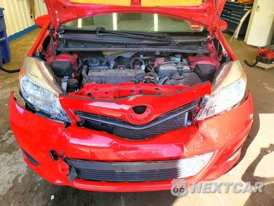 Zdjęcie 11 z 12 samochodu: 2012 TOYOTA YARIS 3-DOOR L VIN:JTDJTUD31CD512368 - miniatura