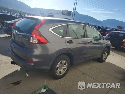 Trzecie zdjęcie samochodu z tyłu: 2015 HONDA CR-V LX VIN:2HKRM4H30FH696355 - miniatura