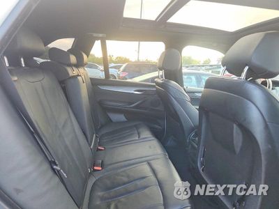 Zdjęcie 11 z 14 samochodu: 2014 BMW X5 XDRIVE35I VIN:5UXKR0C54E0C24869 - miniatura