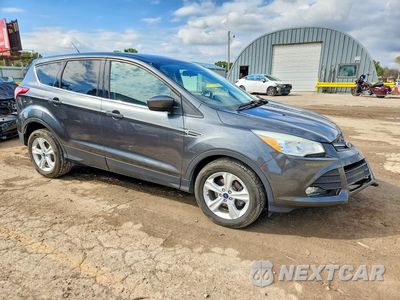 Czwarte zdjęcie samochodu z boku: 2016 FORD ESCAPE SE VIN:1FMCU0GX2GUB98129 - miniatura