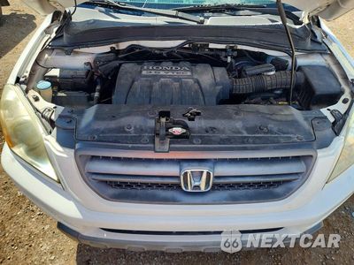 Zdjęcie 11 z 12 samochodu: 2005 HONDA PILOT EXL VIN:2HKYF18595H521705 - miniatura