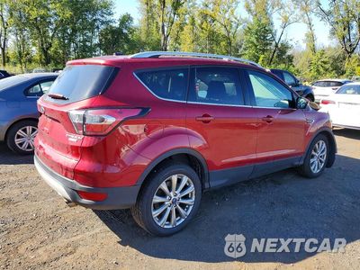 Trzecie zdjęcie samochodu z tyłu: 2017 FORD ESCAPE TITANIUM VIN:1FMCU9JD0HUF00831 - miniatura