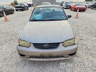 Piąte zdjęcie samochodu w środku: 2002 TOYOTA COROLLA LE VIN:1NXBR12E42Z574329 - miniatura