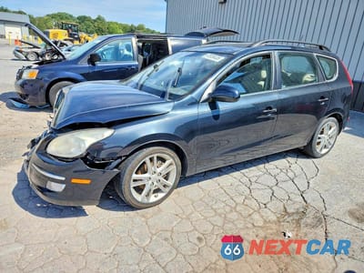 Trzecie zdjęcie samochodu z tyłu: 2010 HYUNDAI ELANTRA TOURING SE VIN:KMHDC8AE5AU063389 - miniatura