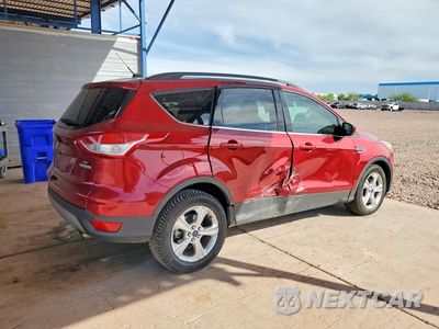 Trzecie zdjęcie samochodu z tyłu: 2016 FORD ESCAPE SE VIN:1FMCU0G98GUA39830 - miniatura