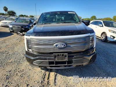 Zdjęcie 12 z 14 samochodu: 2024 FORD F150 LIGHTNING LARIAT VIN:1FT6W5L74RWG07933 - miniatura