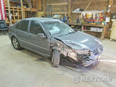 Czwarte zdjęcie samochodu z boku: 2005 VOLKSWAGEN JETTA GLS TDI VIN:3VWSR69M75M053450 - miniatura