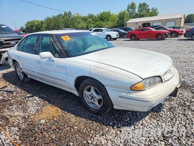 Czwarte zdjęcie samochodu z boku: 1999 PONTIAC BONNEVILLE SE VIN:1G2HX52K1XH253158 - miniatura