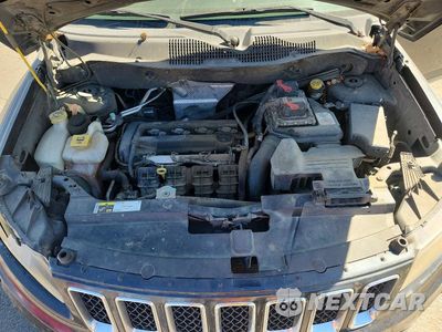 Zdjęcie 12 z 13 samochodu: 2014 JEEP COMPAS VIN:1C4NJCBA9ED630609 - miniatura