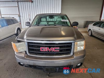 Piąte zdjęcie samochodu w środku: 2007 GMC NEW SIERRA C1500 VIN:1GTEC19C27Z516480 - miniatura