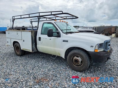Czwarte zdjęcie samochodu z boku: 2003 FORD F350 SUPER DUTY VIN:1FTWF32SX3ED84823 - miniatura