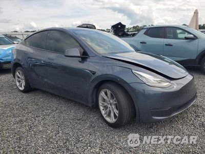 Czwarte zdjęcie samochodu z boku: 2022 TESLA MODEL Y VIN:7SAYGDEE6NA022782 - miniatura