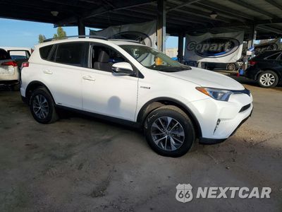 Czwarte zdjęcie samochodu z boku: 2017 TOYOTA RAV4 HYBRID XLE VIN:JTMRJREV6HD138367 - miniatura