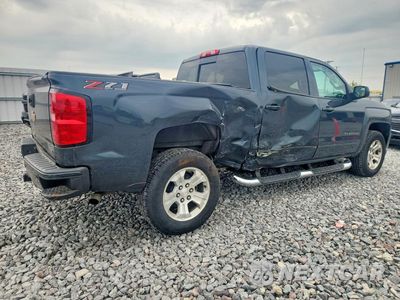 Trzecie zdjęcie samochodu z tyłu: 2018 CHEVROLET SILVERADO K1500 LT VIN:3GCUKREC0JG524040 - miniatura