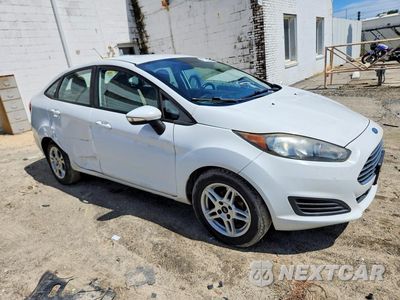 Czwarte zdjęcie samochodu z boku: 2014 FORD FIESTA SE VIN:3FADP4BJ5EM165644 - miniatura