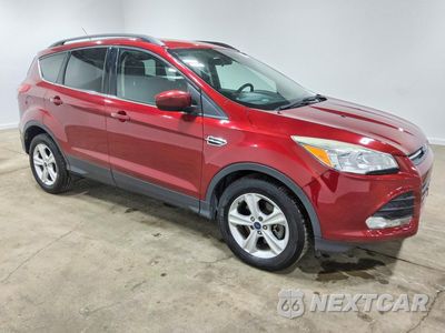 Czwarte zdjęcie samochodu z boku: 2016 FORD ESCAPE SE VIN:1FMCU9GX4GUB56582 - miniatura