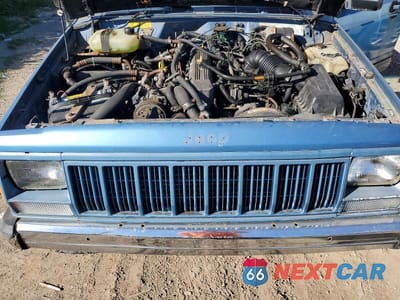 Zdjęcie 12 z 13 samochodu: 1990 JEEP CHEROKEE LAREDO VIN:1J4FJ58L4LL148491 - miniatura