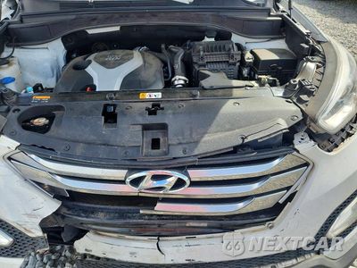 Zdjęcie 12 z 13 samochodu: 2015 HYUNDAI SANTA FE SPORT 2.0T VIN:5XYZW4LA0FG296142 - miniatura